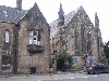 Here is Christ Church on Bridge Street, and its Rectory alongside. The tradition here is 'high'. The church was built in 1850 to a design by Architect H J Stevens of Derby, and it is a large, aisleless hall without architectural division at the chancel or sanctuary. Its superb acoustics and open layout make it a popular venue for musical concerts. It has Victorian stained glass and a wrought and cast iron rood screen. Memorials include a brass plaque to George Herbert Strutt